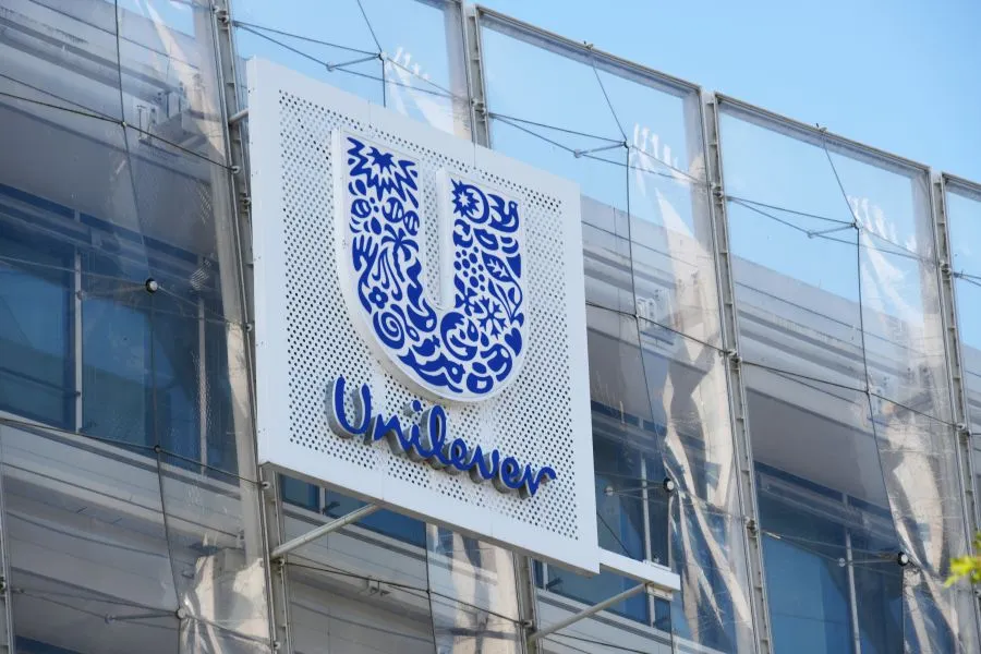 A Unilever sign on the side of a building.