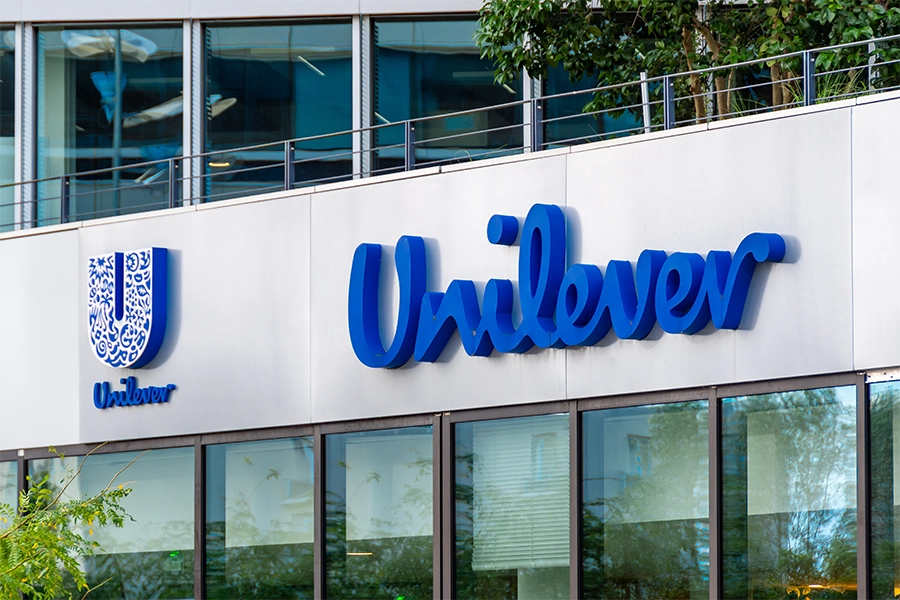 Unilever brand logo and office building.