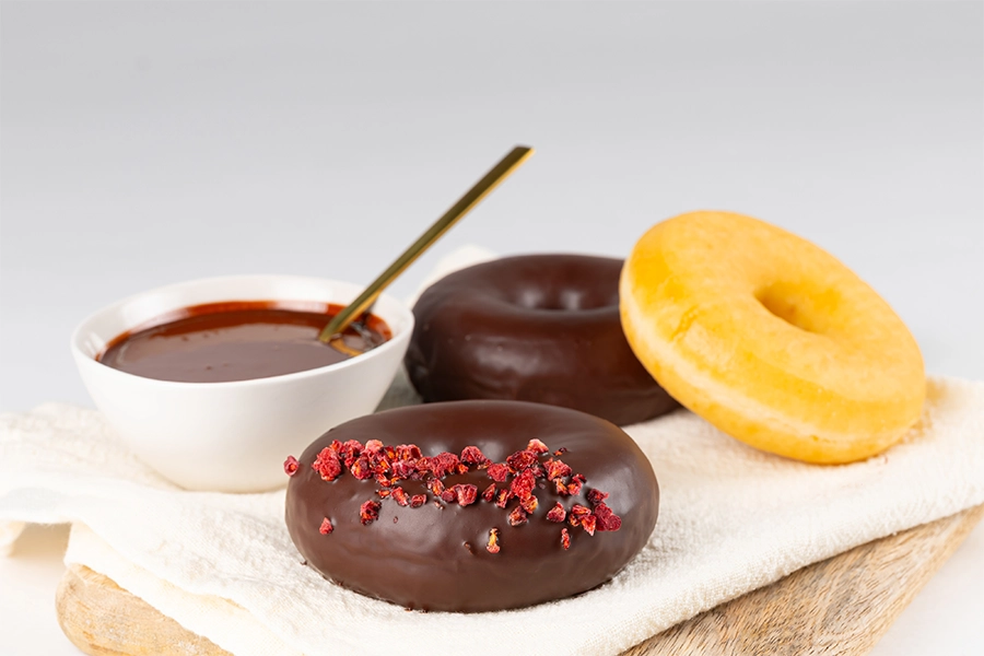 Chocolate donuts made with sustainable cocoa alternative.