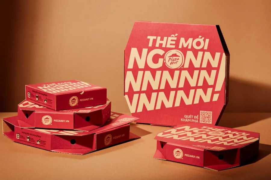 A group of red pizza boxes.