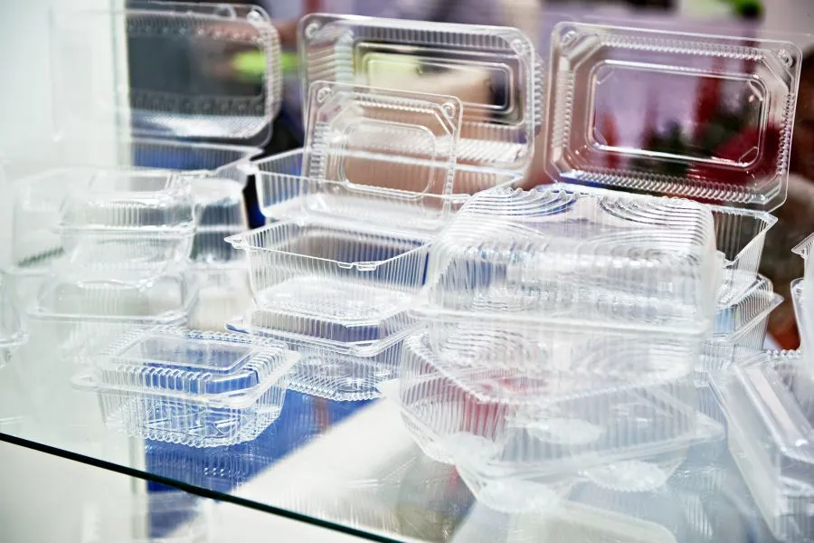 Several plastic containers on a table.
