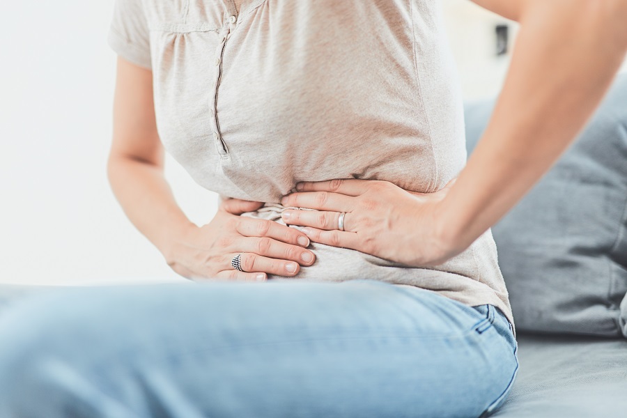 Woman with stomach pain